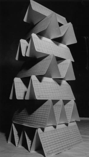 Punch cards arranged as a house of cards.