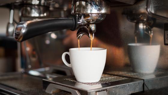 Illustration: An espresso cup in an espresso maker.